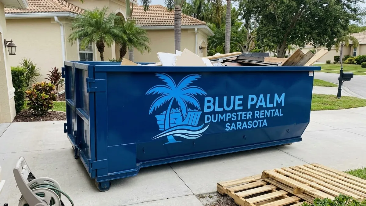 Blue Palm Dumpster Rental crew standing with a roll-off truck and 30 yard dumpster in a Sarasota, FL driveway Blue Palm Dumpster Rental crew standing with a roll-off truck and 30 yard dumpster in a Sarasota, FL driveway